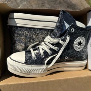Converse Black and White High-Top Sneakers